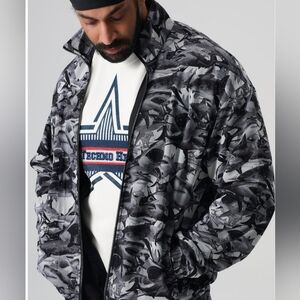 REEBOK MEN'S WINDBREAKER JACKET...